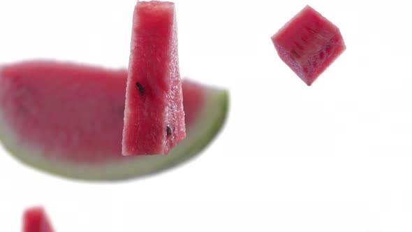 Flying of Watermelon and Slices in White Alpha Matte Background