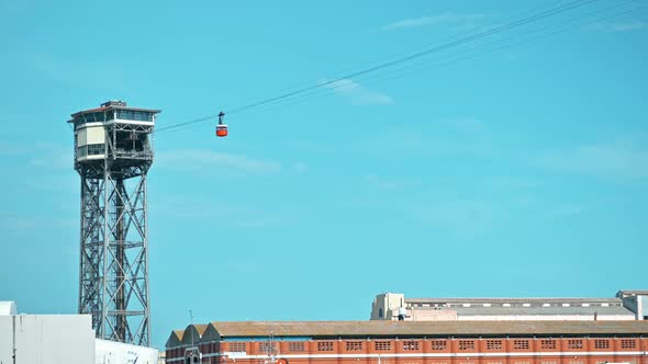 A tower with a cable car, building in Barcelona, Spain