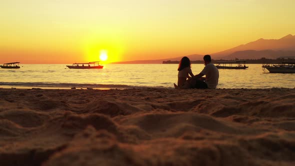 Romantic Lady and Man in Love Dating on Vacation Enjoy Life on Beach on Summer White Sandy 