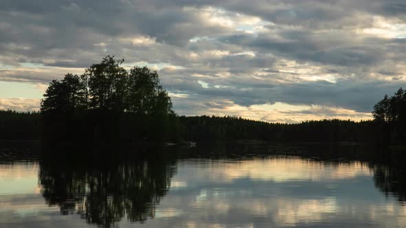 lake reflecting during a sunset timelapse