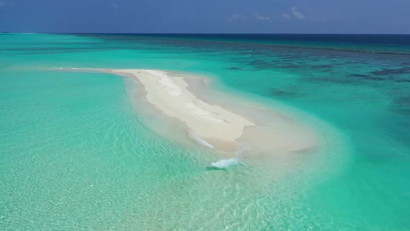 Aerial flying over scenery of tropical coast beach trip by blue sea and clean sand background of a d