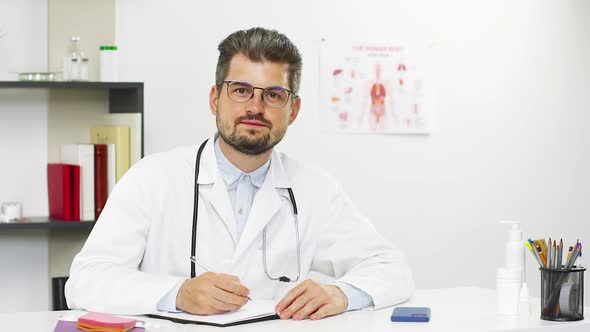 Doctor on Video Call with Patient Giving Online Consultation