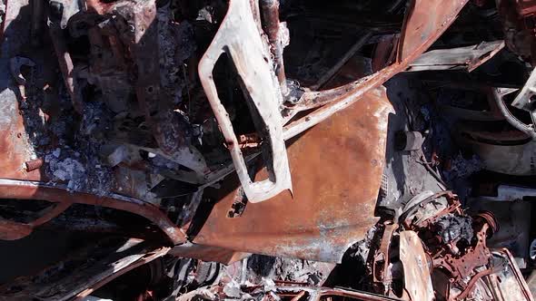 Vertical Video of a Dump of Cars Destroyed By the War in Ukraine