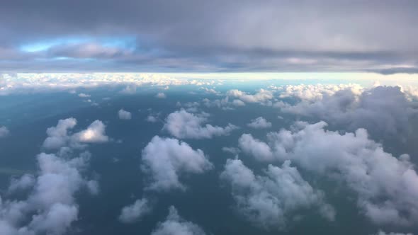 flying in between two different cloud formations,cirrocumulus below and stratos above