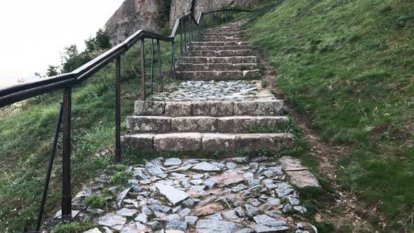 Ancient stairways in the rocks 4K 2160p 30fps UltraHD footage  - Climbing up the stone stairs POV 38