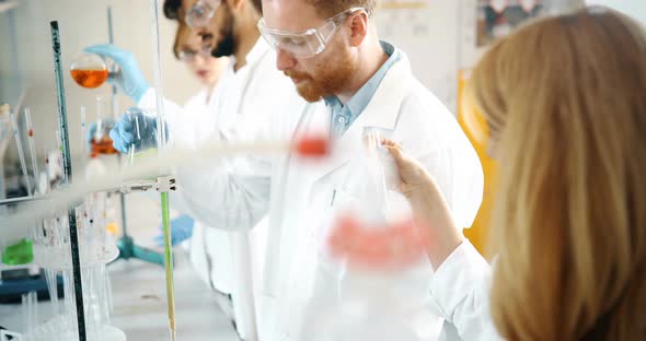 Group of Chemistry Students Working in Laboratory