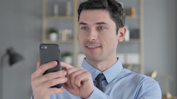 Excited Young Man Winning Online on Tablet