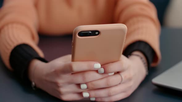 Female Student Typing on Smartphone with Touch Screen