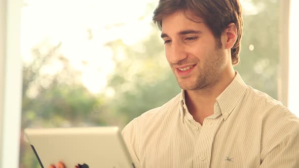 Man using digital tablet