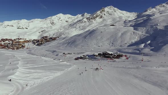 Aerial view of people skiing at a ski resort