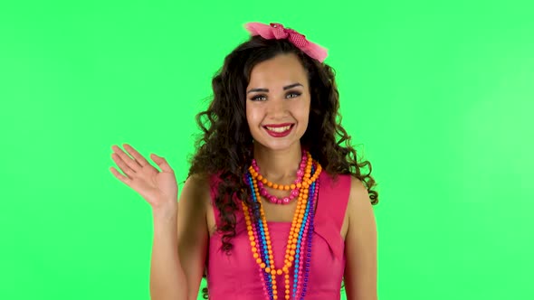 Woman Waving Hand and Showing Gesture Come Here. Green Screen