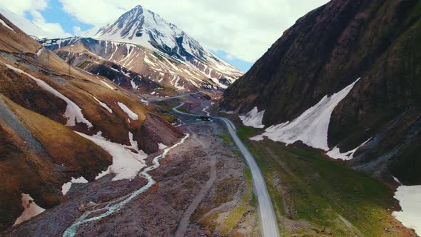 Beautiful Drone Shot of a Road in Kazbegi and Mountains Georgia