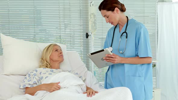 Doctor speaking with her patient