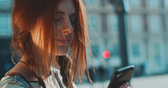 Attractive young woman using a smartphone