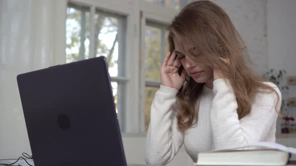 Tired Woman with Laptop