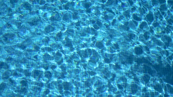 A game of glare on the water in the pool