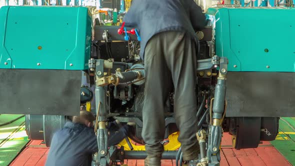 Conveyor Assembly Stage the Body of Tractor at Big Industrial Factory Timelapse