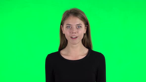 Very Surprised Girl with Shocked Wow Face Expression. Green Screen