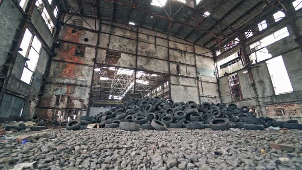 Bunch of tires from wheels. Pile of used tires lays at an old dump