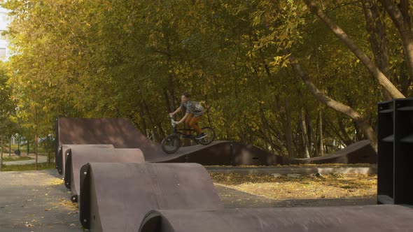 Biker Riding on the Pump Track