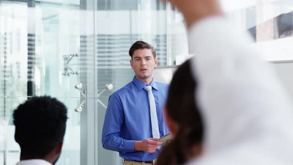 Businessman giving a presentation in a meeting