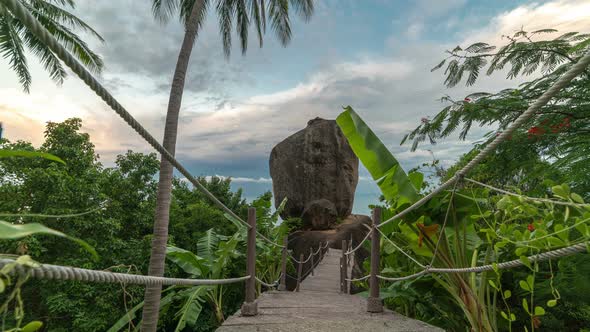 A bridge to a huge stone on the Lamai Beach in Thailand