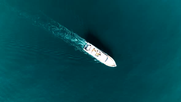 The yacht calls at the port aerial view 4 K