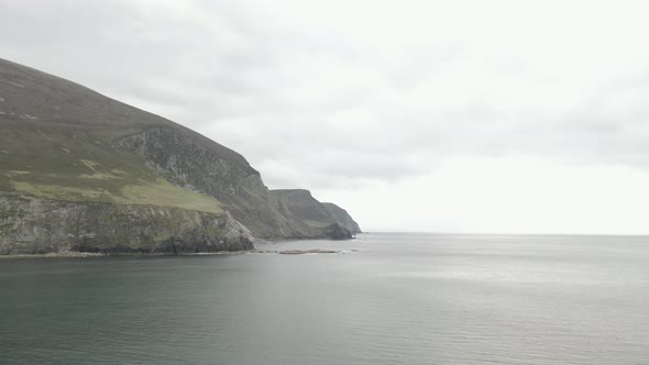 Tranquility Of Keel Beach With The Cathedral Rock Cliffs On Achill Island, County Mayo, Ireland. Aer