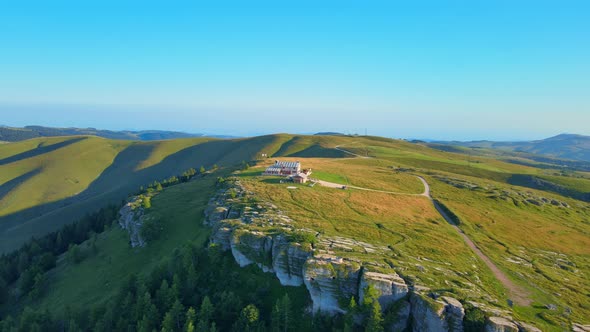 Drone flight over the mountain at sunset on a beautiful day