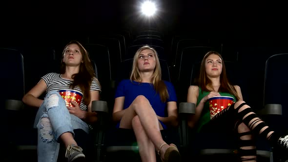 Cute Girl Watching Movie in Cinema Theater. Exciting Moment