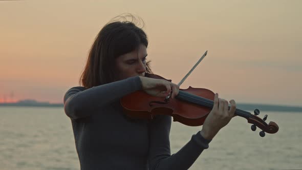 Lady Musician Is Playing Violin Solo