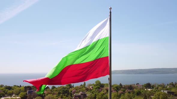 Bulgaria Flag Against City Varna at Summer Day