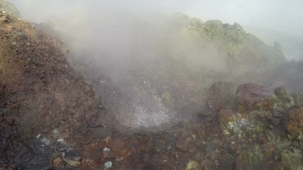 Hot Springs, Splashing of Boiling Water and Fumes Surrounded by Fumaroles
