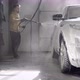 Car Washing at Selfservice Station Hose for Spraying Soap Foam in a Garage - VideoHive Item for Sale