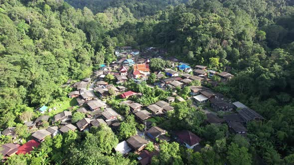 Aerial view of Paa Meang village,  Houses in valley, Lampang, Thailand by drone
