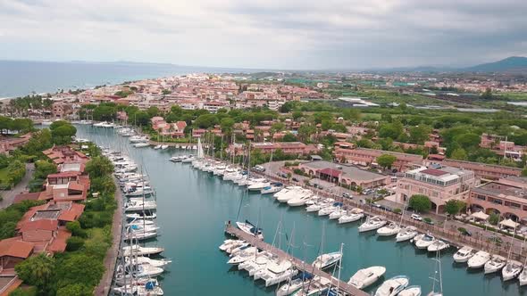 Aerial View on White Sailing Yachts at Portorosa, Furnari, Italy. Mediterranean Sea, Mountains and