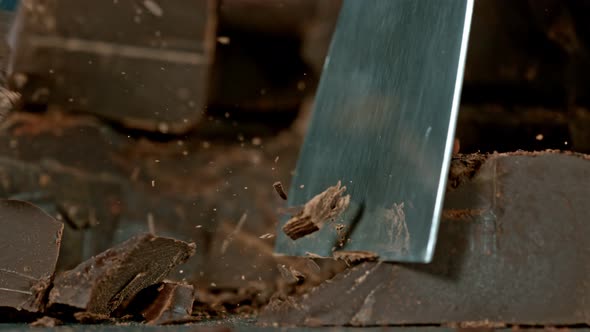 Super Slow Motion Shot of Cutting Raw Chocolate Chunk at 1000 Fps.