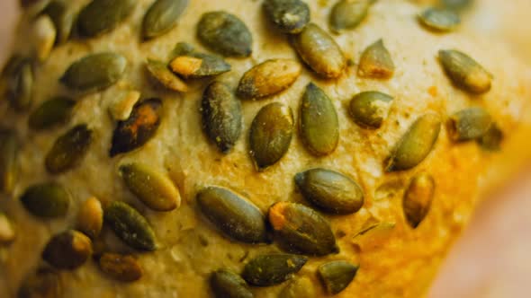 Two Freshly Baked Square Loaves of Bread with Pumpkin Seeds