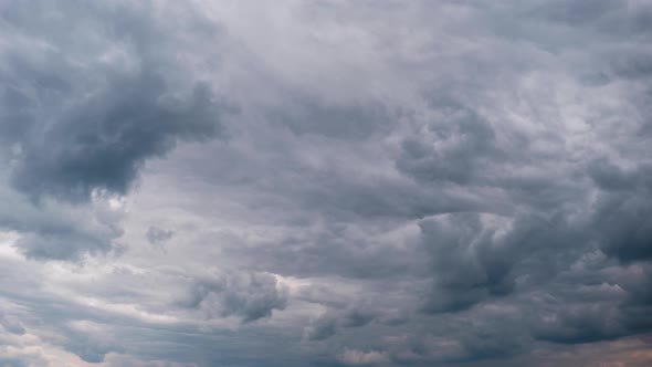 Timelapse of Gray Cumulus Clouds Moves in Blue Dramatic Sky Cirrus Cloud Space