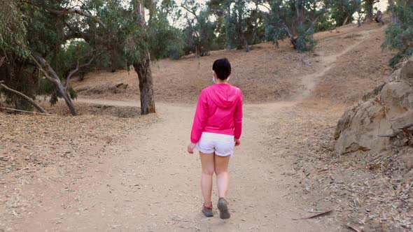 Asian woman going for a hike