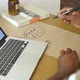 Education Stock Footage 4 K Ultra Hd Clips   A Man Writing On A Paper In Front Of His Laptop - VideoHive Item for Sale