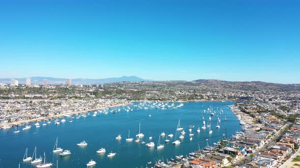 An aerial view of stunning Newport harbor on a sunny day full of luxury boats