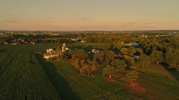 Aerial View of Amish Farms and Fields During the Golden Hour