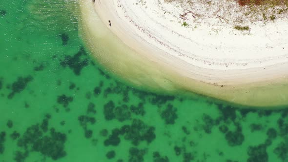 Beautiful round sandbank in emerald Thailand waters. Ao Nai Wok beach, crystal clear seawater with c