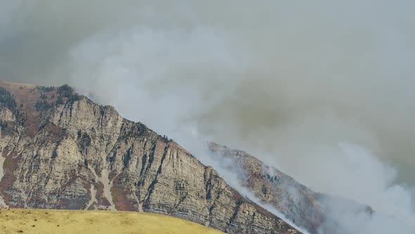 Smoke rising on mountain in Utah during wildfire