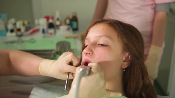 Process of Whitening of Teeth in Dental Cabinet