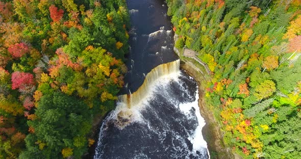 Aerial Flying Down Towards Amazing Tahquamenon Falls in Michigan During Peak Fall