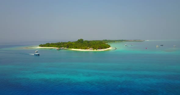 Wide angle aerial abstract shot of a white paradise beach and blue sea background in best quality 4K