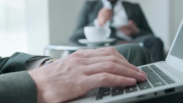 Using Laptop During Coffee Break