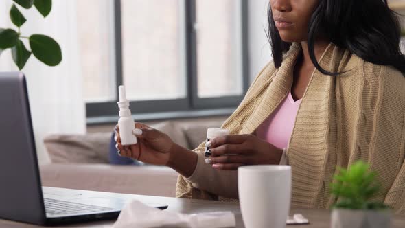 Sick Woman Having Video Call on Laptop at Home